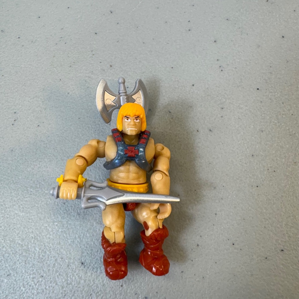 Masters of the Universe He-Man Mini Action Figure with Sword and Axe 2 Inch